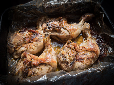 Chicken baked in the oven. Selective focus.