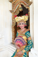 balinese legong dancer at the decorative window