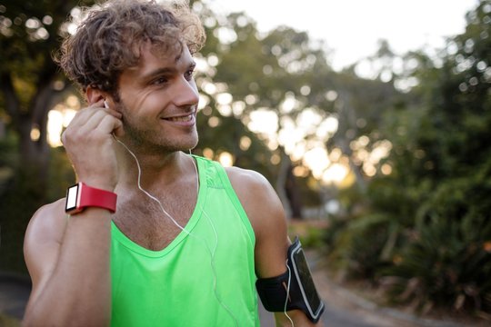 Man listening to music while jogging