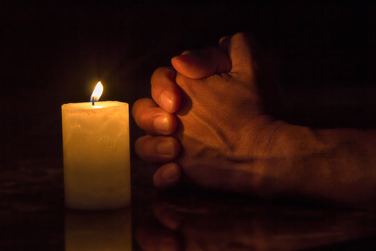 Men praying in the night