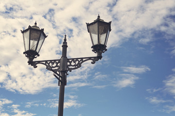 Fototapeta na wymiar Lamp post and blue sky