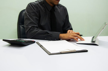 Businessman working at office. Digital tablet laptop computer smart phone using, keyboard. Connection internet application online. Finance manager. Banking. Professional investor.