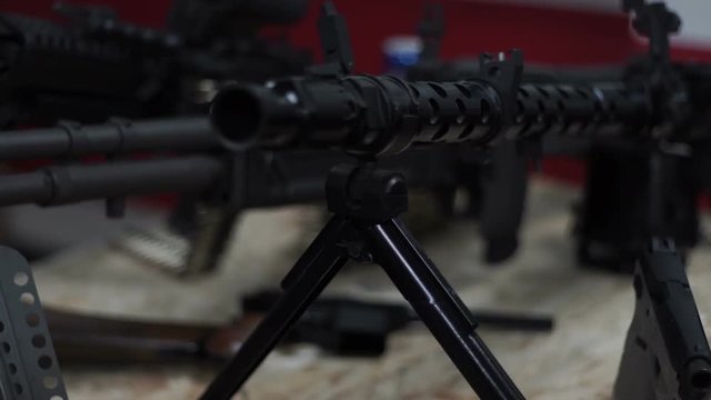 The machine-gun is on the bipods on the floor