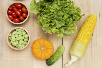 Closeup fresh vegetable on wooden background, helthy food concept