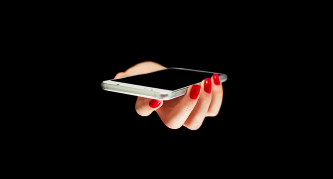 Horizontal view of modern phone, technology concept. Woman hand holding phone, with black background