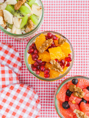 Oatmeal with fruit and cereals in a glass jar