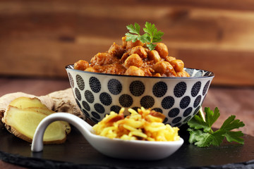 Chana Masala indian dish spicy Chick Peas also known as Chola Masala or Chole served in a white bowl