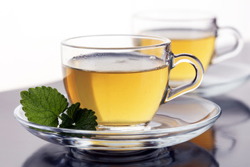 Herbal dry sri lanka tea. Mint leaf. Tea in a glass cup, mint leaves, dried tea, in a restaurant or teahouse