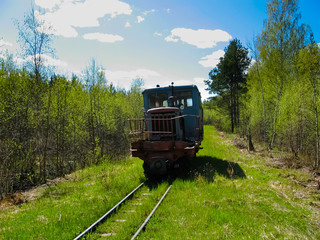 Narrow-gauge motor-vehicle on the railways of the peat enterprise in the village of Gladkoe, Leningrad region