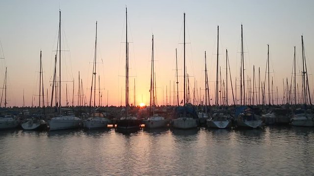 Yachts at the pier at sunset in Ashdod, Israel
