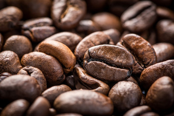 Roasted coffee beans macro shots. Close-up coffee beans