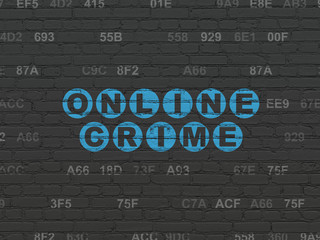 Security concept: Online Crime on wall background