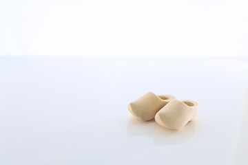 Pair of Dutch Wooden Shoes with a White Background
