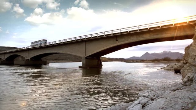 Bus Crossing Bridge Over Neuquen River, Early Morning Light, Chos Malal, Patagonia, Argentina