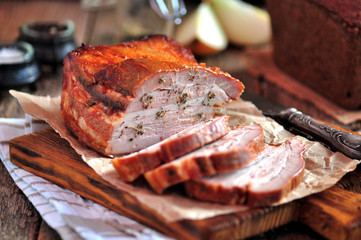 Delicious organic baked pork belly in tomato sauce, soy sauce and honey.