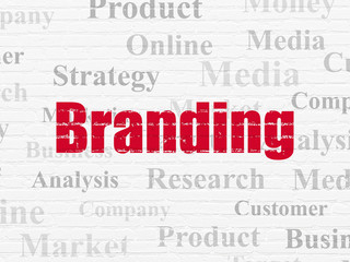 Marketing concept: Branding on wall background