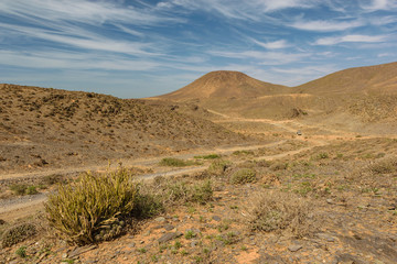 Car on a dirt road, Guelmim-Es Semara, Morocco