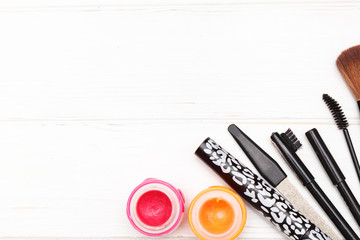 Brushes for women's cosmetics on white boards