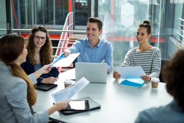 Smiling business team discussing in a meeting