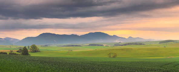 Fototapeta premium Summer sunset in mountain valley