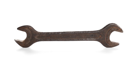 old rusty metal wrench isolated on white