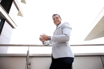 Portrait of an handsome businessman in an urban setting.