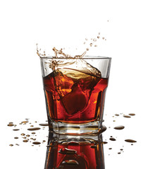 Splash in glass of scotch whiskey with ice cubes
