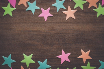 plastic toy stars on the wooden table