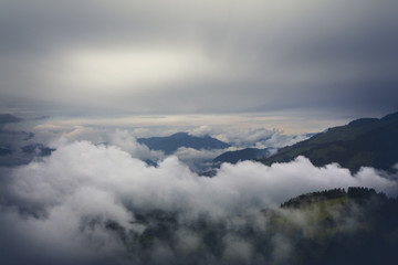 Fototapeta na wymiar Misty landscape on Kitzbuhel mountain, Tirol, Austria