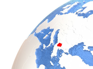 Macedonia on metallic globe with blue oceans
