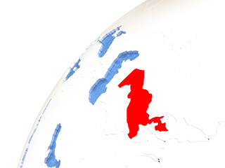 Uzbekistan on metallic globe with blue oceans