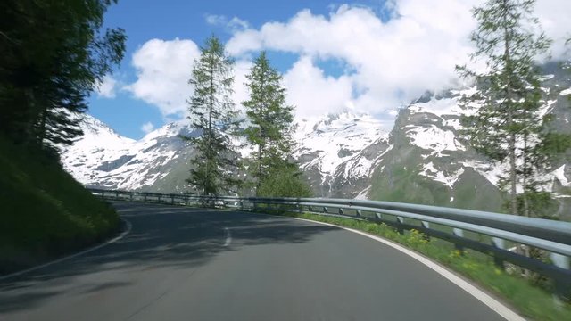 Driving on Grossglockner Hochalpenstrasse (High Alpine Road) in Salzburgland, Austria.