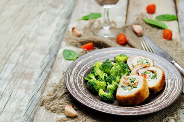 Ricotta tomato spinach stuffed turkey with broccoli