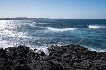 The splash of the waves on the rocky coast of the Atlantic Ocean
