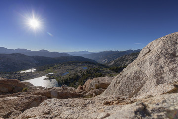 Hot Sun Over Sierra Nevada Mountains - The summer sun burns bright over the Sierra Nevada mountains in California. 