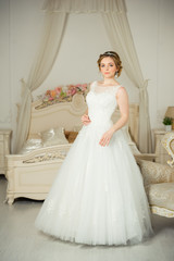 Fototapeta premium Beautiful bride before wedding ceremony in appartament