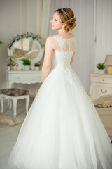 Fototapeta premium Beautiful bride before wedding ceremony in appartament