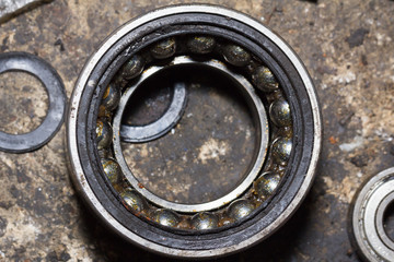 Ball Bearings on cement background