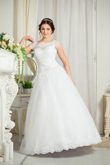 Obraz premium Beautiful bride before wedding ceremony in appartament