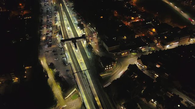 City Train Station Time Lapse at Night Aerial View