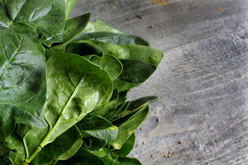 Grey wooden table with vegetables, onions, mushrooms, peppers, asparagus and spices. Process of cooking. Concept food. cooking.