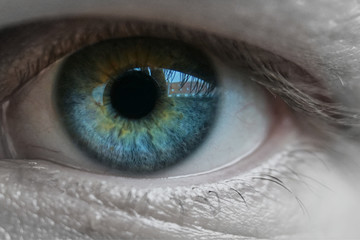 Blue man eye macro shot