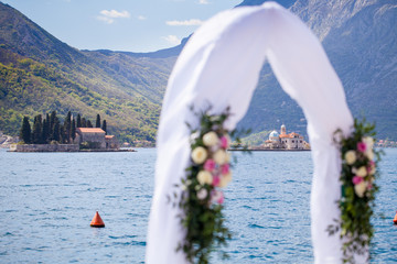 Wedding arch and decoration at Adriatic bay © Andrija