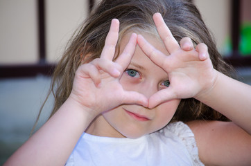 Little adorable girl smiles