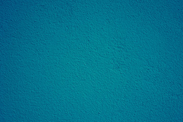 Blue concrete wall painted texture and background seamless