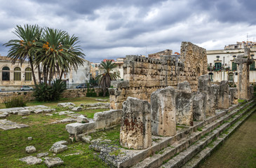 Ruins of Temple of Apollo on the Ortygia - old town of Syracuse on Sicily island, Italy
