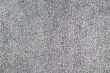 Fototapeta na wymiar Old worn blue jeans texture, 