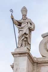Saint Paul figure on the top of Cathedral of Syracuse, loctaed on the Ortygia isle, Sicily island, Italy