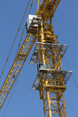 Naklejka premium yellow hoisting crane isolate on white background