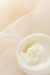 Fototapeta na wymiar white facial cream in plastic bottle for beauty background image